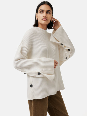 White jumper store with cape